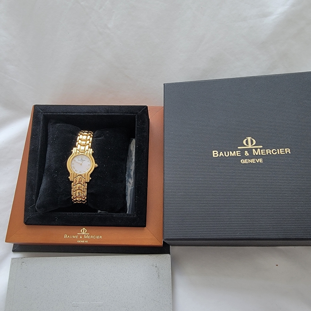 Gold and Mother of pearl Brand new with luxury box